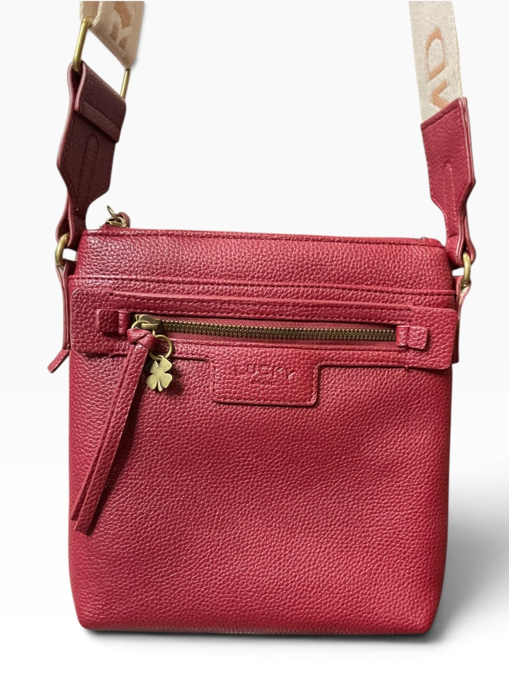 Lucky Brand Pebbled Crossbody in Berry Red with Logo Guitar Strap